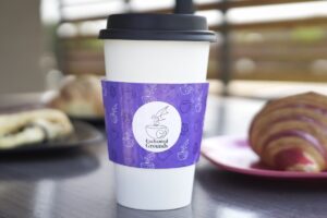 An Enchanted Grounds coffee cup